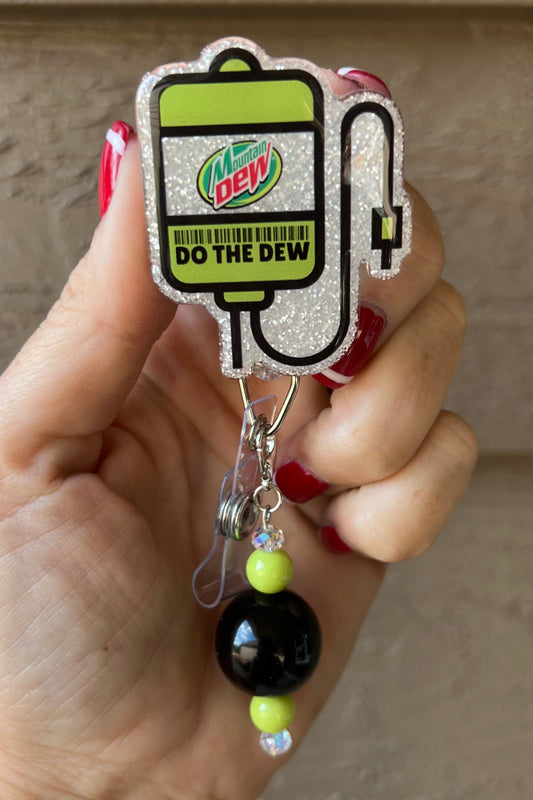 glittery Mountain dew IV badge reel with green and black beaded dangle and "Do the Dew" logo