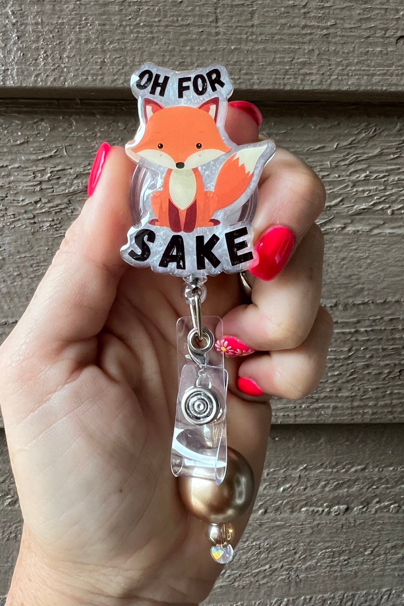 Oh for Fox Sake ID Holder on pearl background with coordinating badge bling.