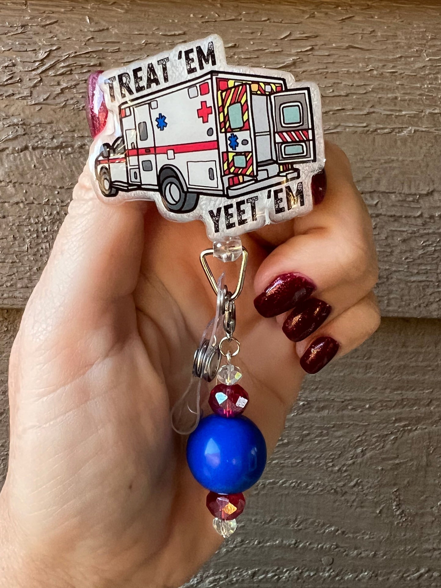 Treat ’Em and Yeet ’Em Funny Ambulance Badge Reel with Free Badge Bling!